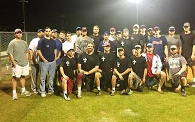 Sigma Chi group picture while playing intramural sports.