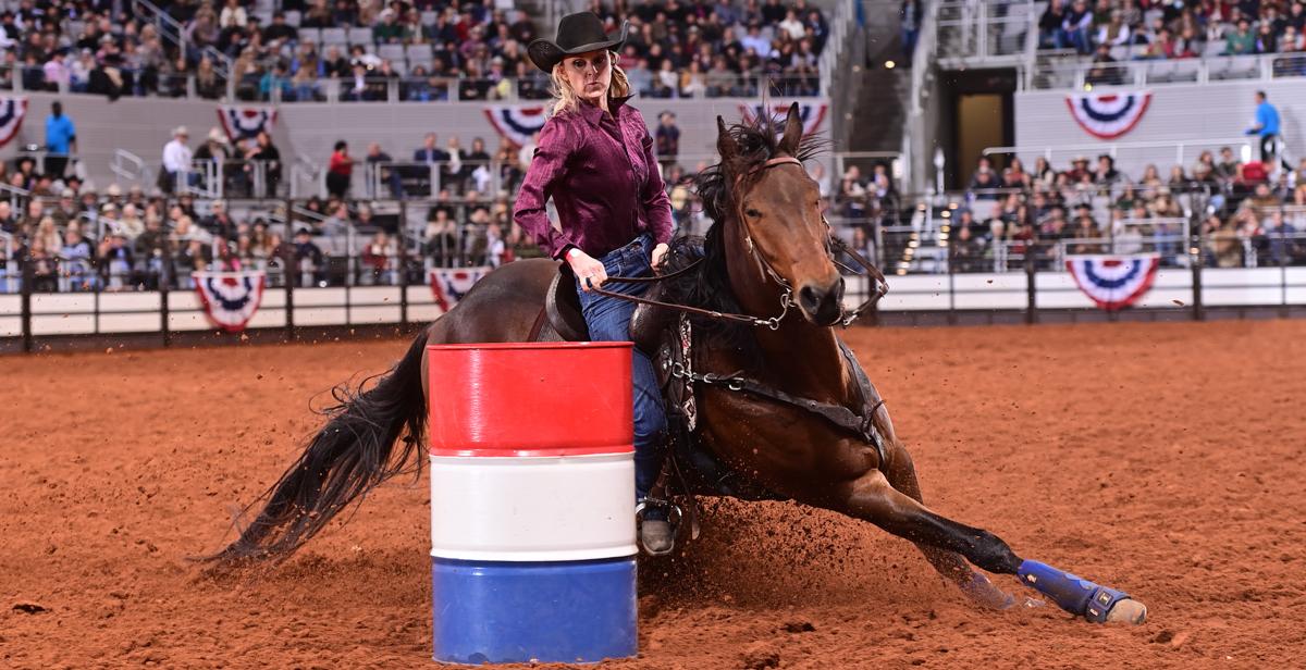 Wenda Johnson, who earned master's and doctorate degrees in nursing from the University of South Alabama, competes in the Fort Worth Stock Show and Rodeo earlier this year. Photo by James Phifer courtesy of the Women's Professional Rodeo Association.